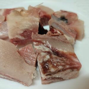 Cap i pota de ternera cortada